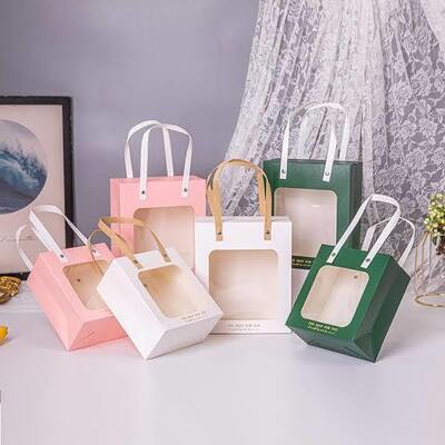 Quality Bulk Cardboard Gift Paper Goodie Bags 350gsm Recyclable Kraft Paper Packaging With Handles factory