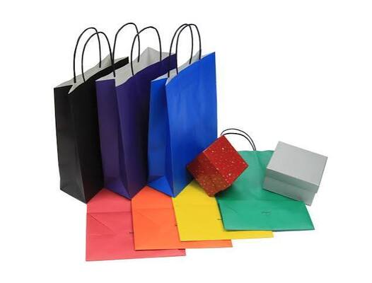 Quality Bulk Cardboard Gift Paper Goodie Bags 350gsm Recyclable Kraft Paper Packaging With Handles factory